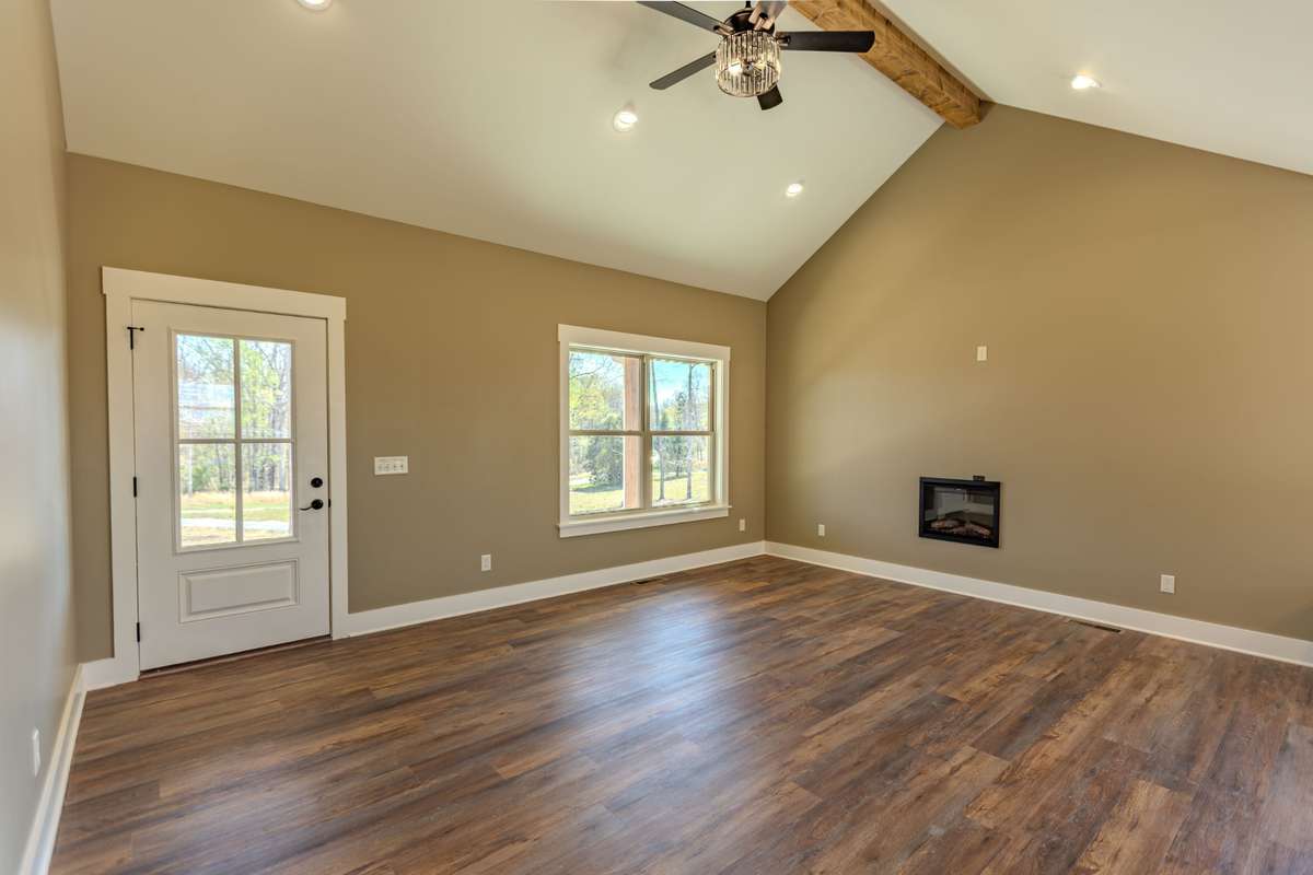 Great room with cathedral ceiling and plenty of lighting,