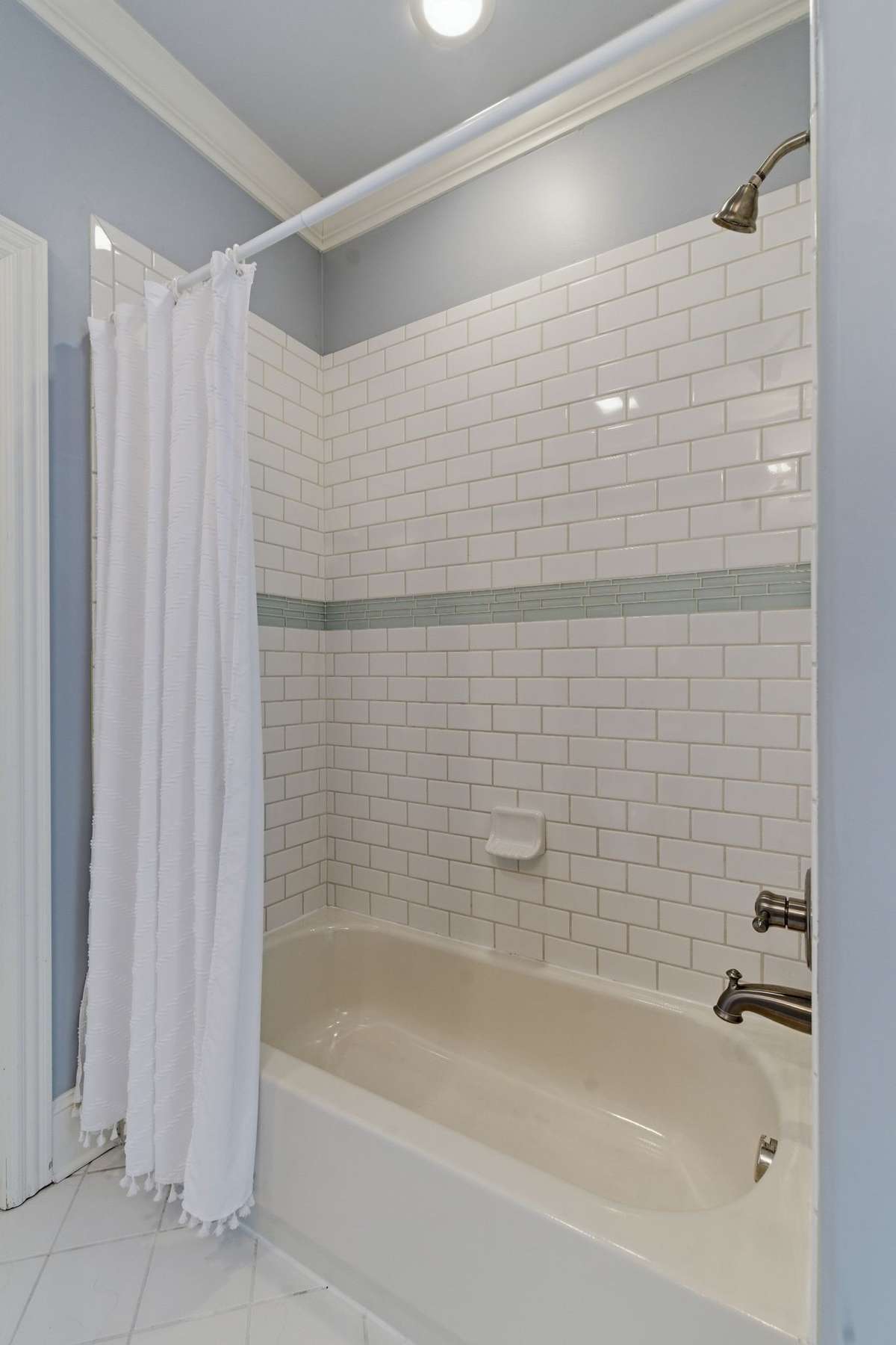 Tiled wall in bathroom #3.