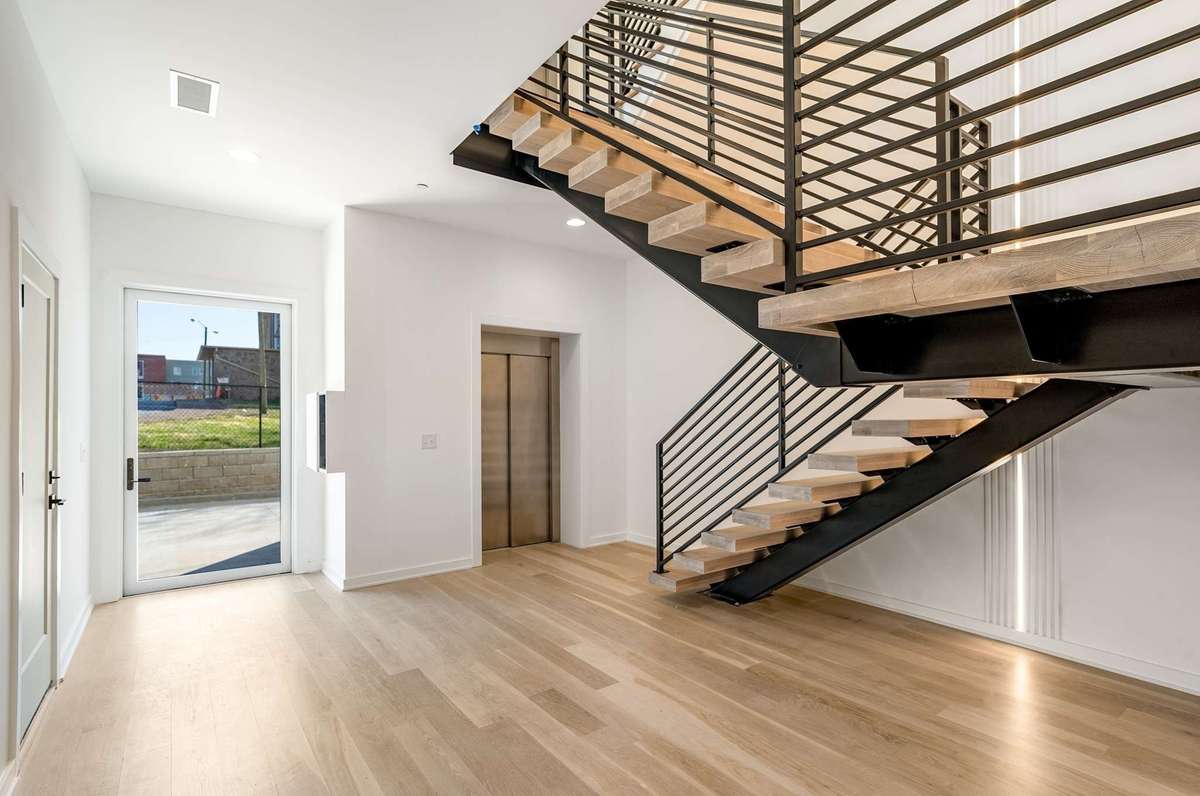 Commercial style elevator doors take you right to the top!
