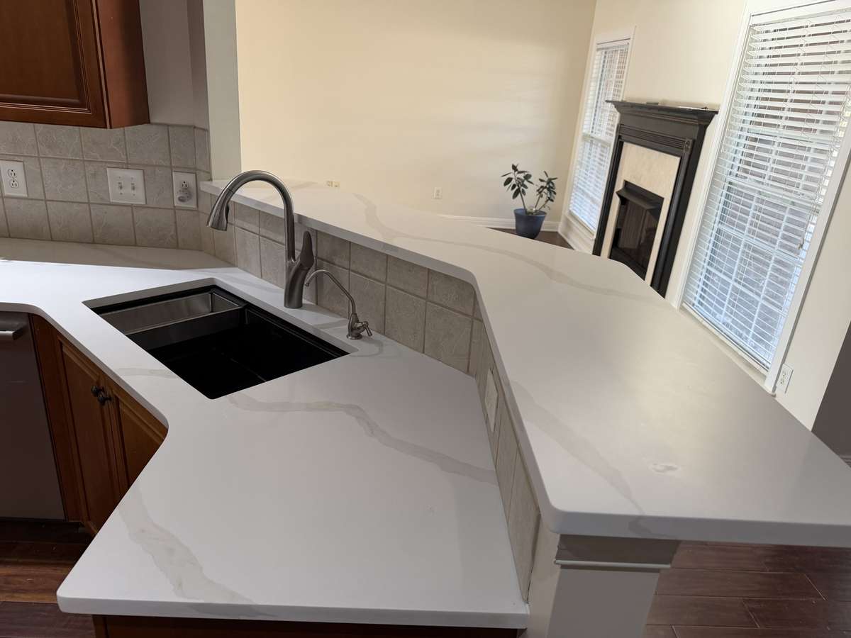 New counters and new kitchen sink with faucet