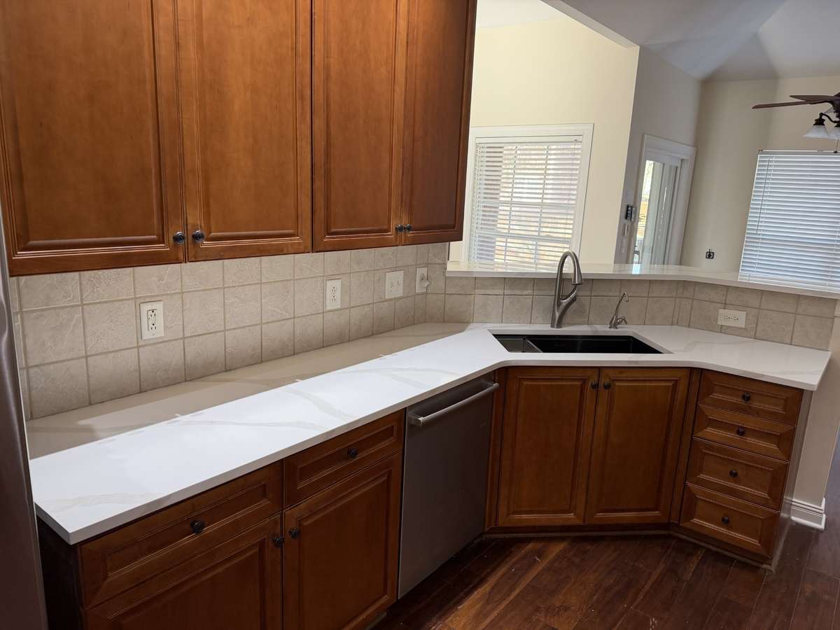 New granite countertops and sink.