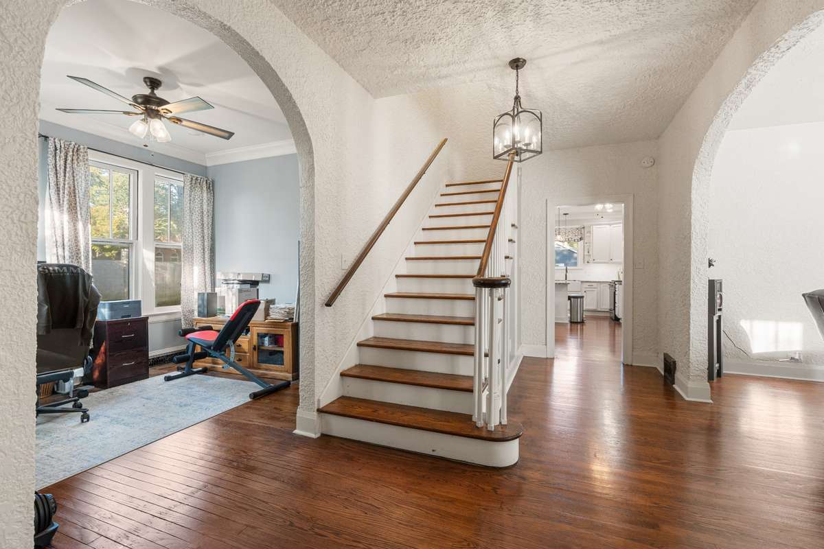 View just inside the front door. To the left is the room used as a office.