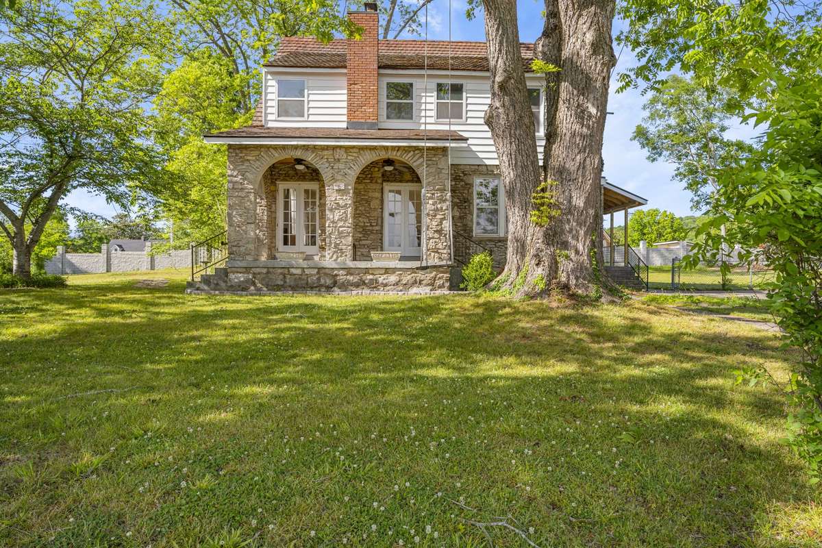 The lovely arches on this porch face West for the perfect view of afternoon sunsets!