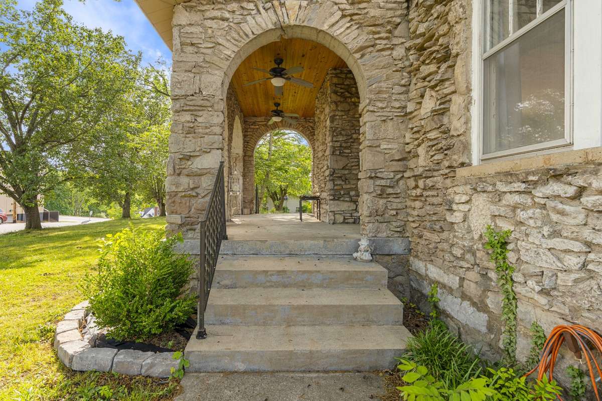 Just up the stairs to the right are two sets of french doors that lead to the living room. Imagine the natural breeze coming into the house!
