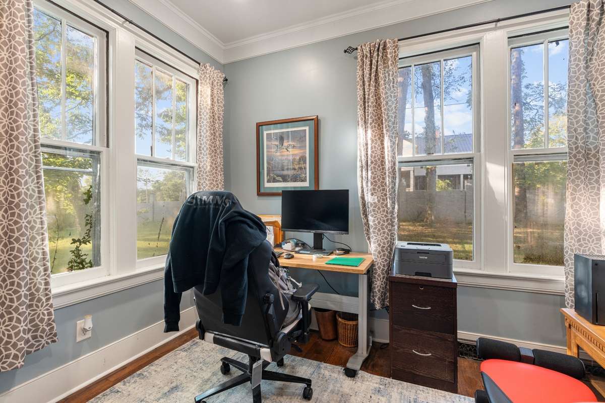 Office space, these windows are the original wood windows as well as the living room and dining room windows . These were retained in order to have some orignal period look to the home.