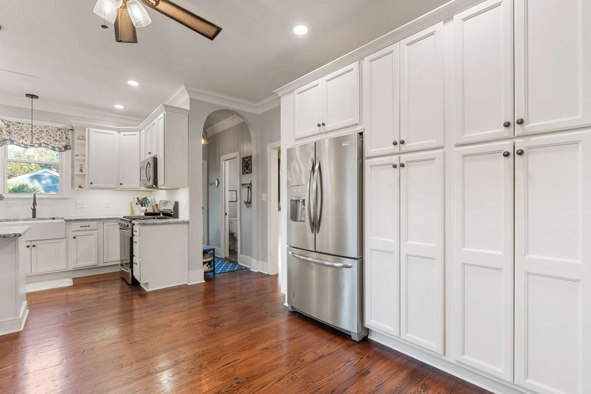 The cabinets to the right provide amazing storage and pantry space that is easliy accessible.