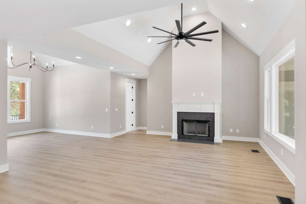 Open Floor plan with a wood burning fireplace.