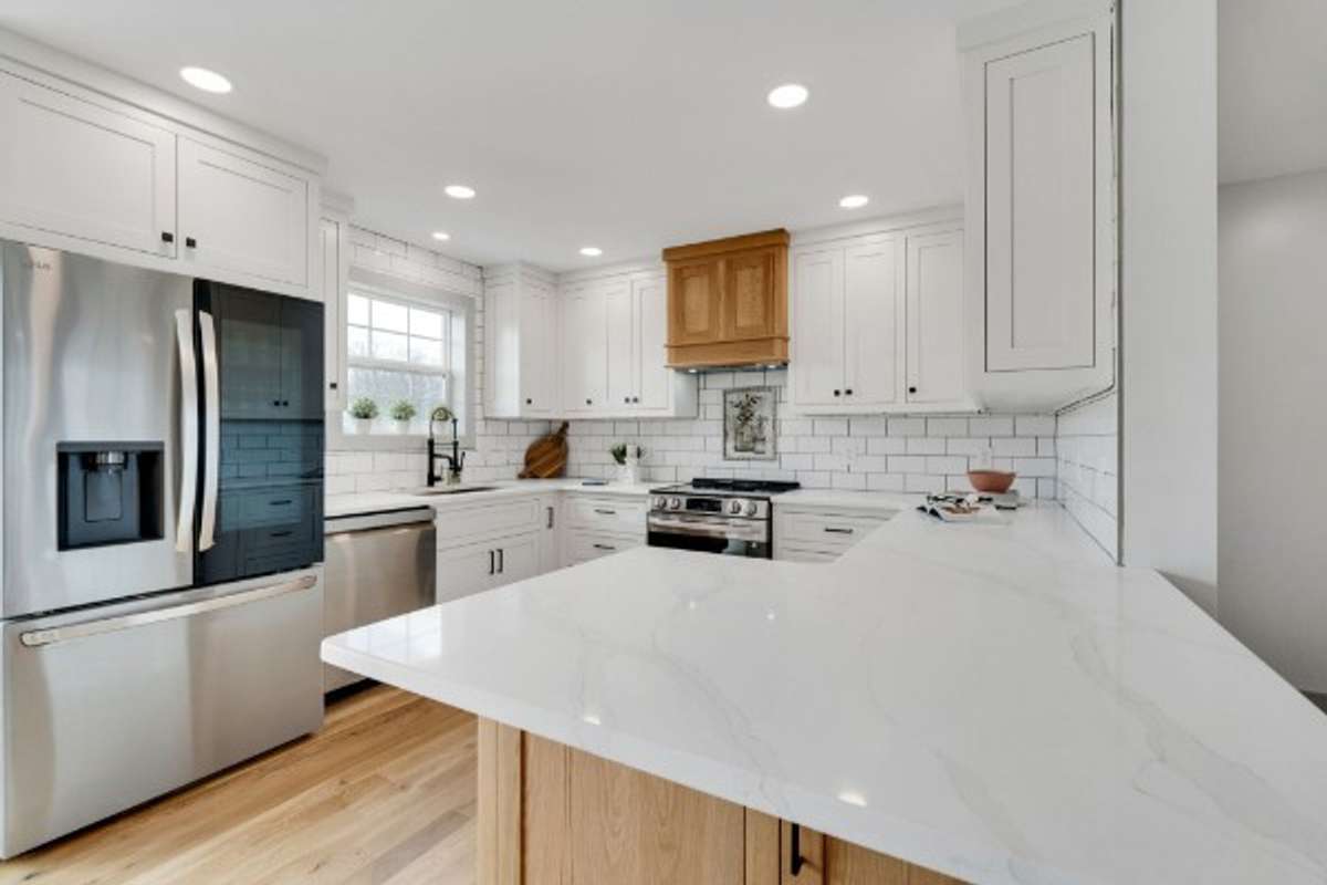 Gorgeous Quartz Counters with Gray and Gold veining . . . Beautiful!  Soft close doors and drawers on Cabinets . . . extra LED Ceiling Lighting . . .