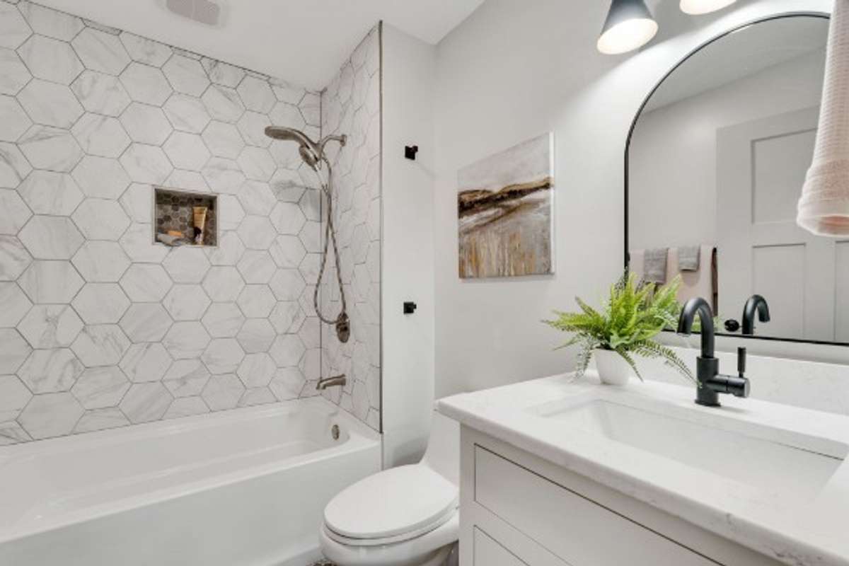 BATH TWO:  First Floor near Secondary Bedrooms Two and Three . . .