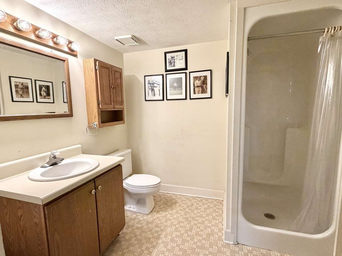 Perfect set up with Basement Full Bath — Great for a quick cool down after a hard work out and fully equipped for guests.