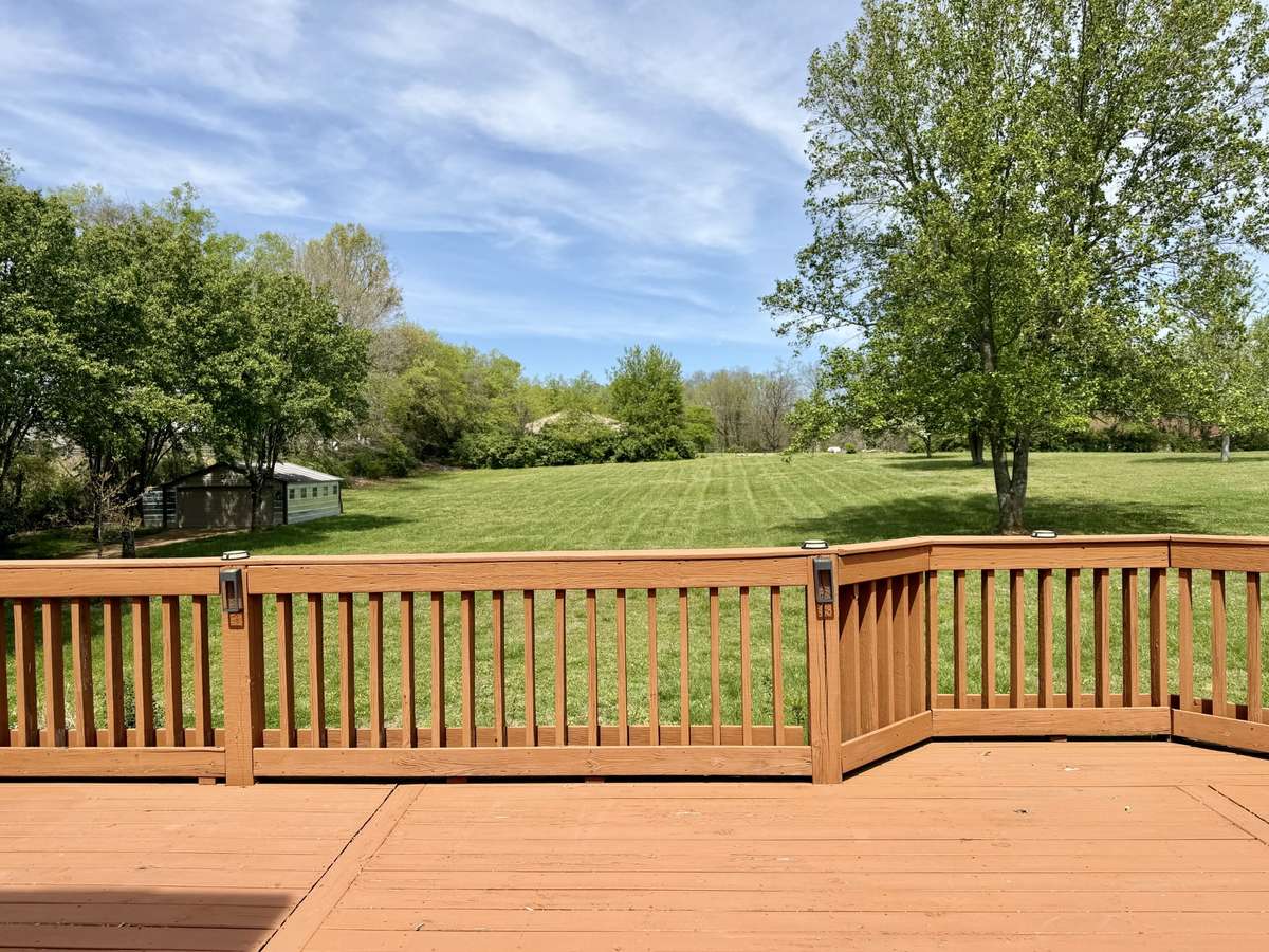 This gorgeous, LEVEL 2.08-acre property offers endless potential—picture hosting memorable family reunions, outdoor celebrations, or even a picturesque wedding right here at home!