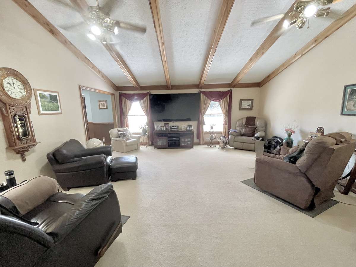 Plenty of room for the whole family to spread out and enjoy time together in this huge family room, designed for comfort, connection, and everyday living.