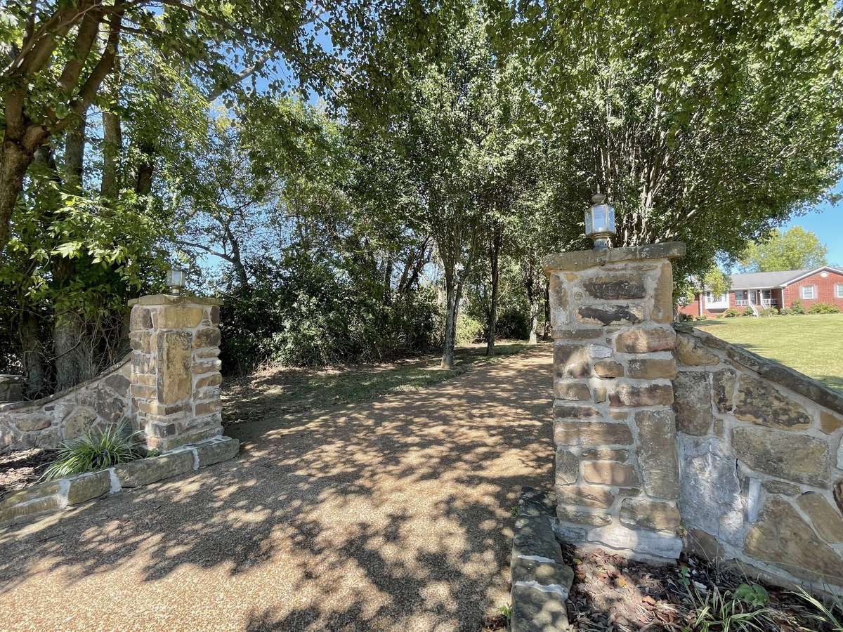 Welcome to COUNTRY-LIKE LIVING with CITY CONVENIENCE on this spacious 2.08-acre LEVEL homesite, offering plenty of ELBOW ROOM, beautiful surroundings, and the perfect backdrop for designing the retreat of your dreams!