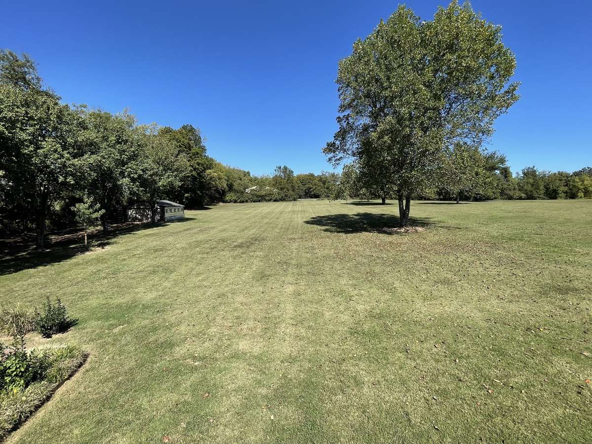 Imagine hosting the next family reunion or wedding on your homestead! With 2.08 acres, there's tons of space, offering tons of possibilities!