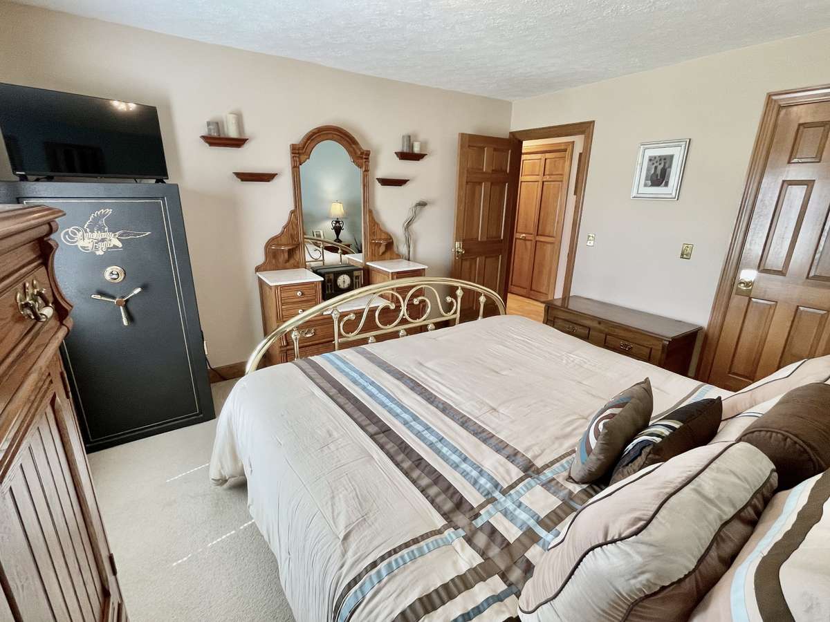 Spacious guest room with walk-in closet.