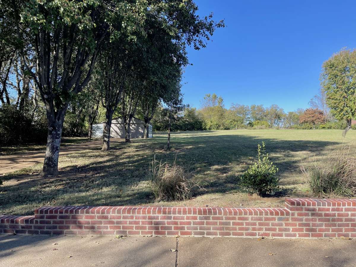 Lots of added parking with 2 car basement garage, extended driveway with parking pad and detached 2 car garage.