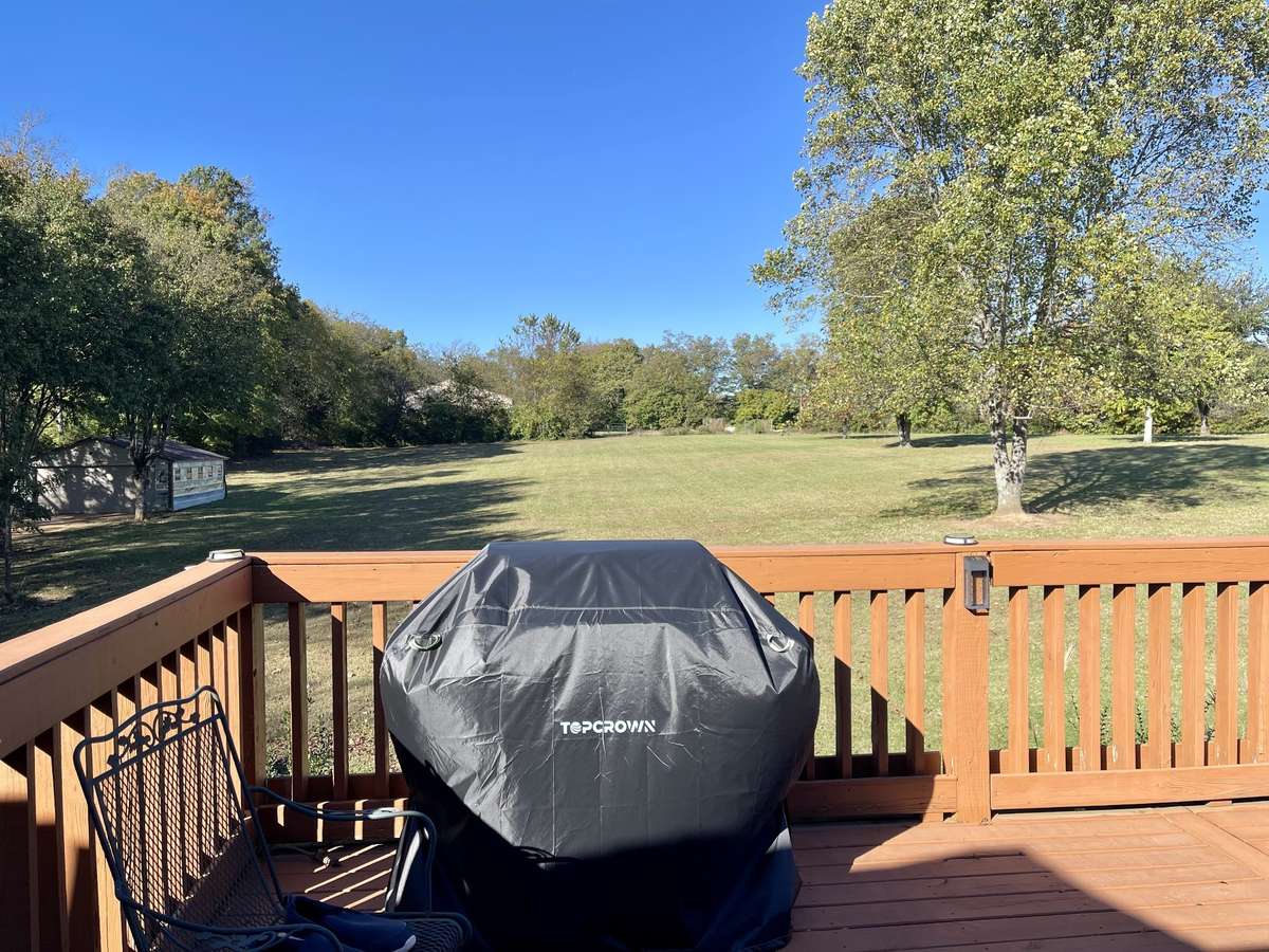Savor meals on your back deck with stunning views of the large picturesque backyard.
