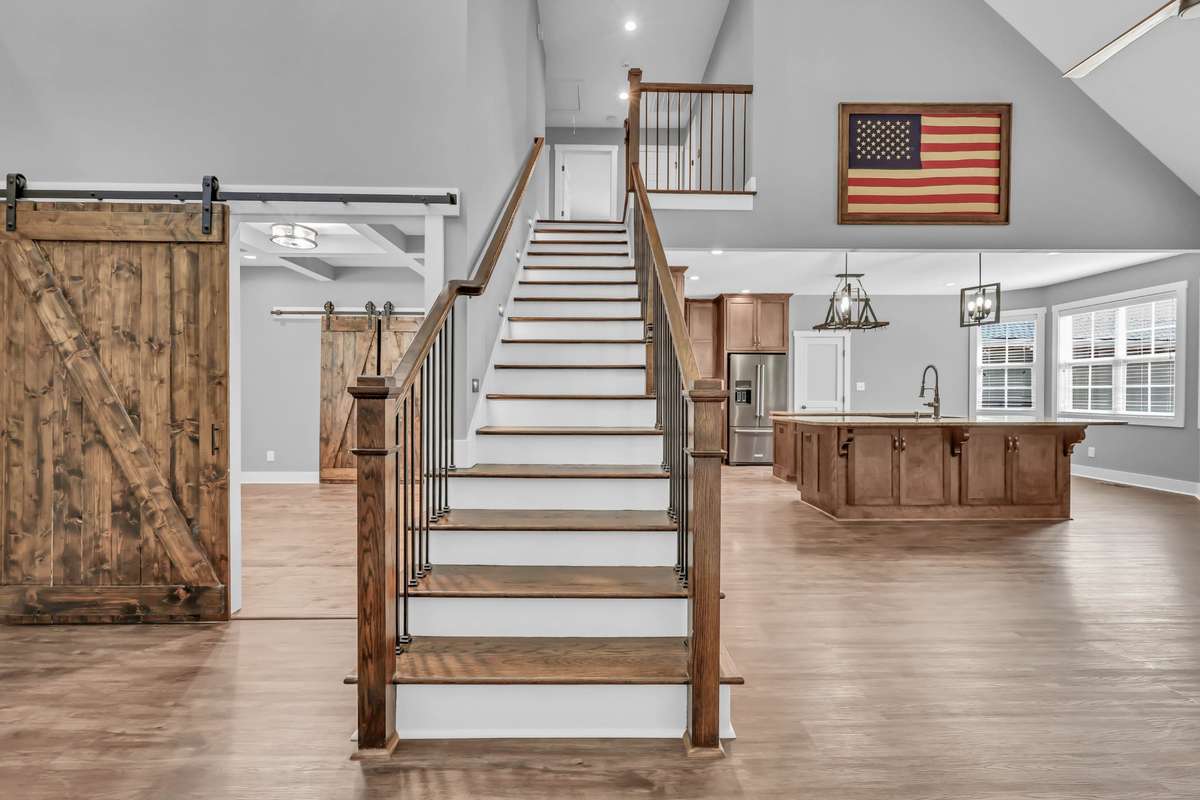 Open staircase with wood treads and risers