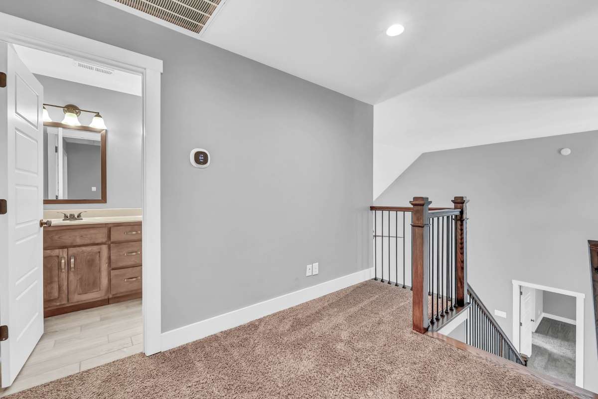 Landing zone at the top of the stairs—room to have a computer or sitting area.