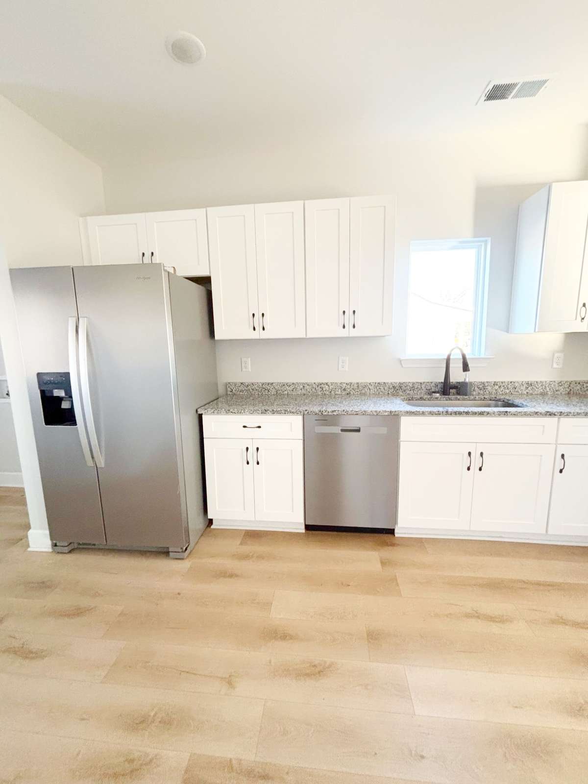 Large kitchen-stainless steel appliances-ample counter and cabinet space