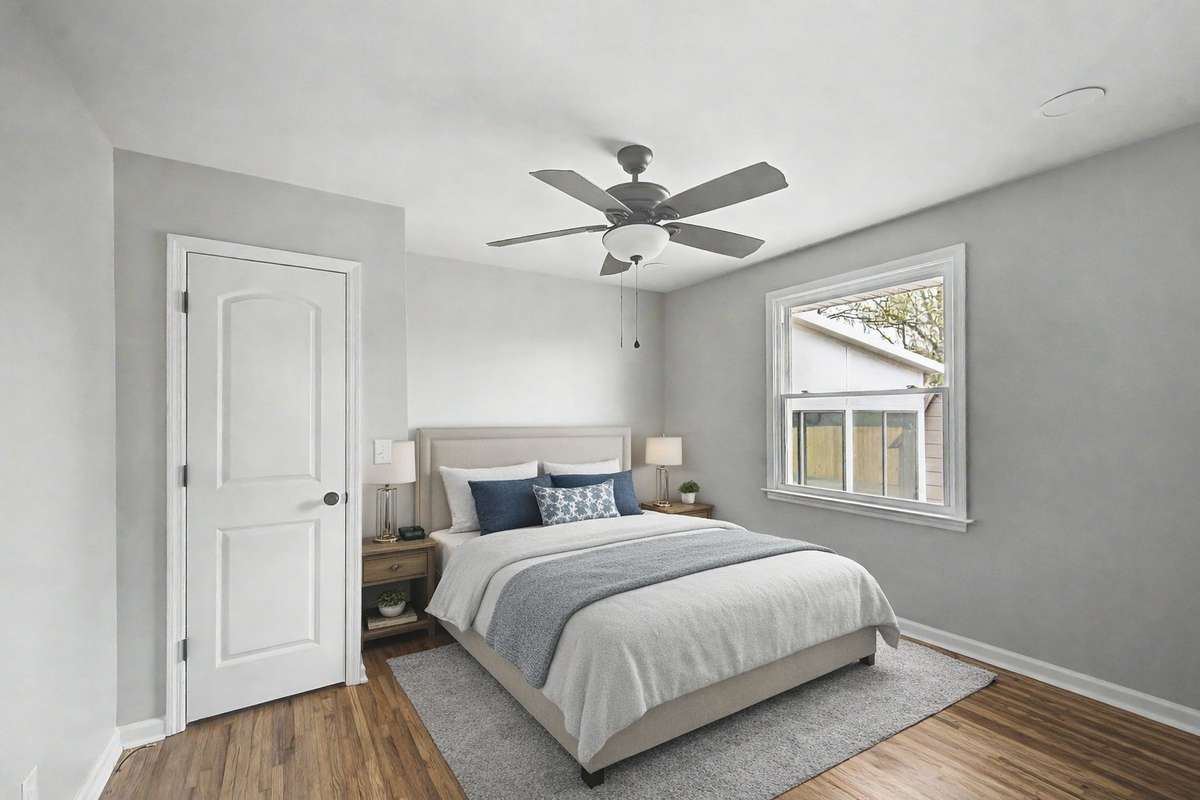 Bedroom 2 has new floors, new fan and custom paint