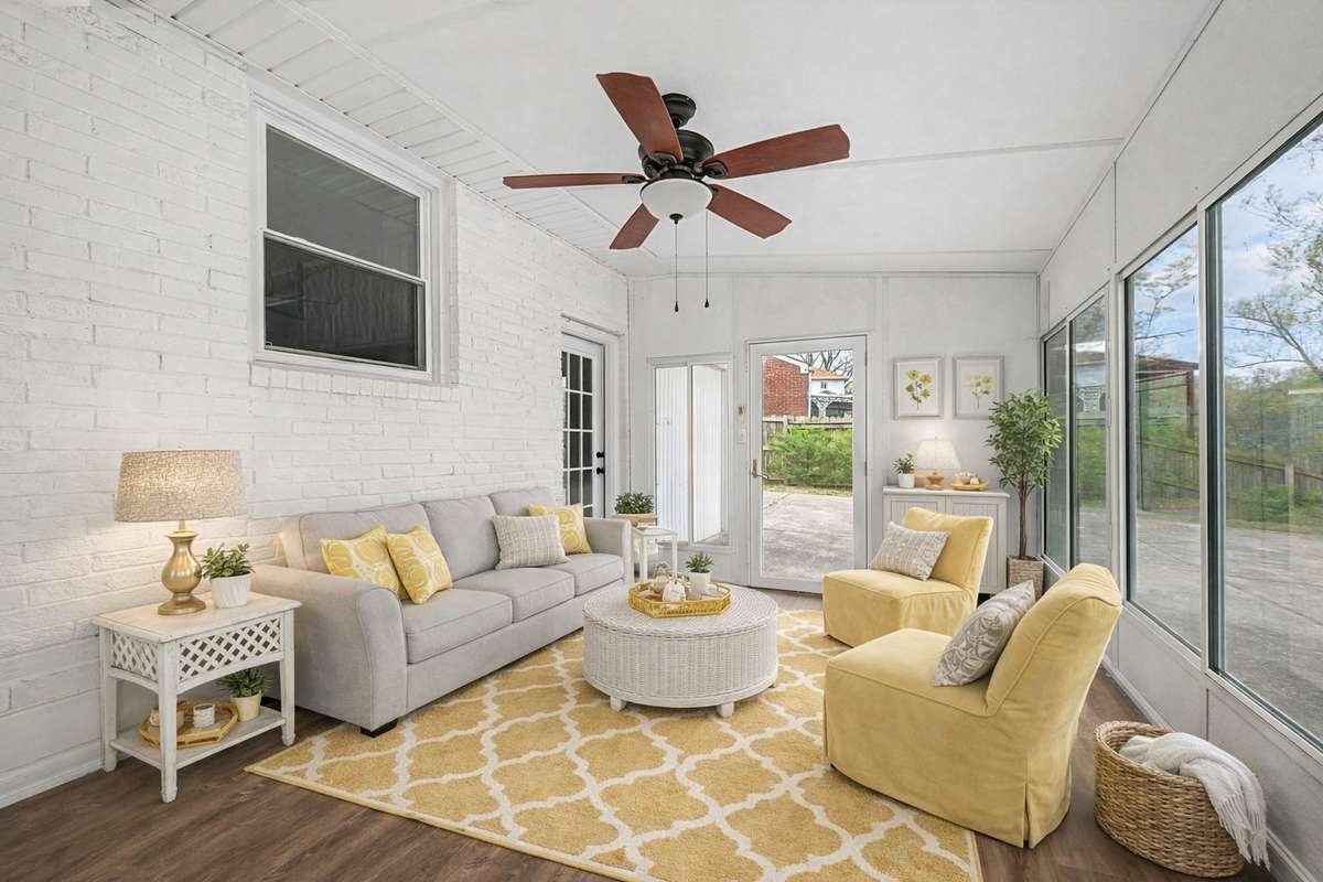 This lovely sunroom is large enough to accommodate all your furniture needs and more.