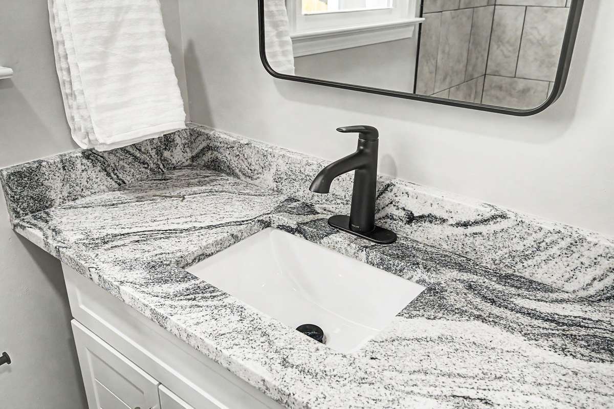 The granite on this vanity is stunning.