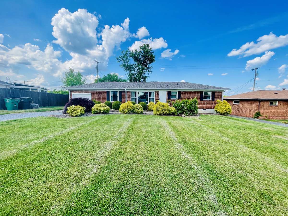 Large yard with mature landscaping