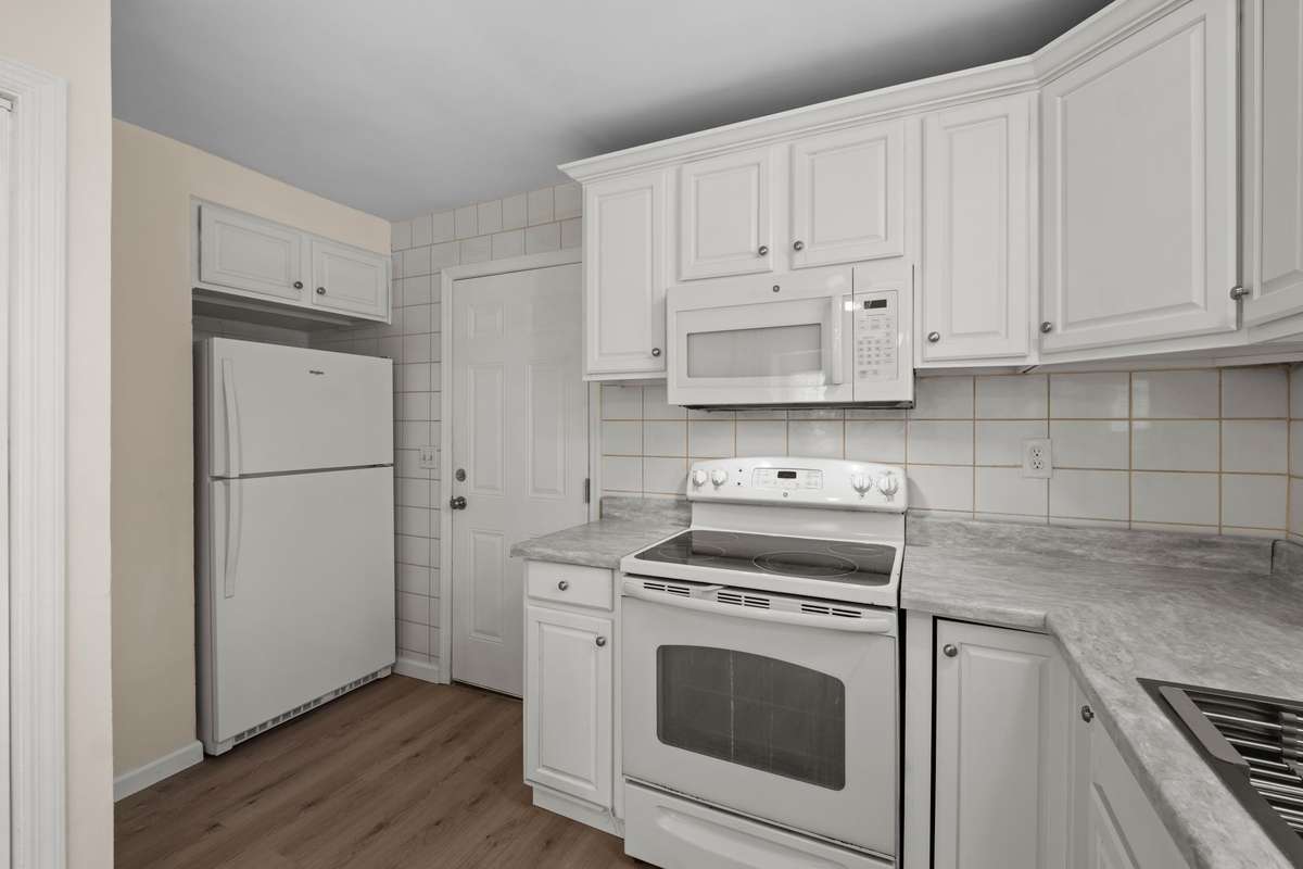 Range with built microwave!  New refrigerator!