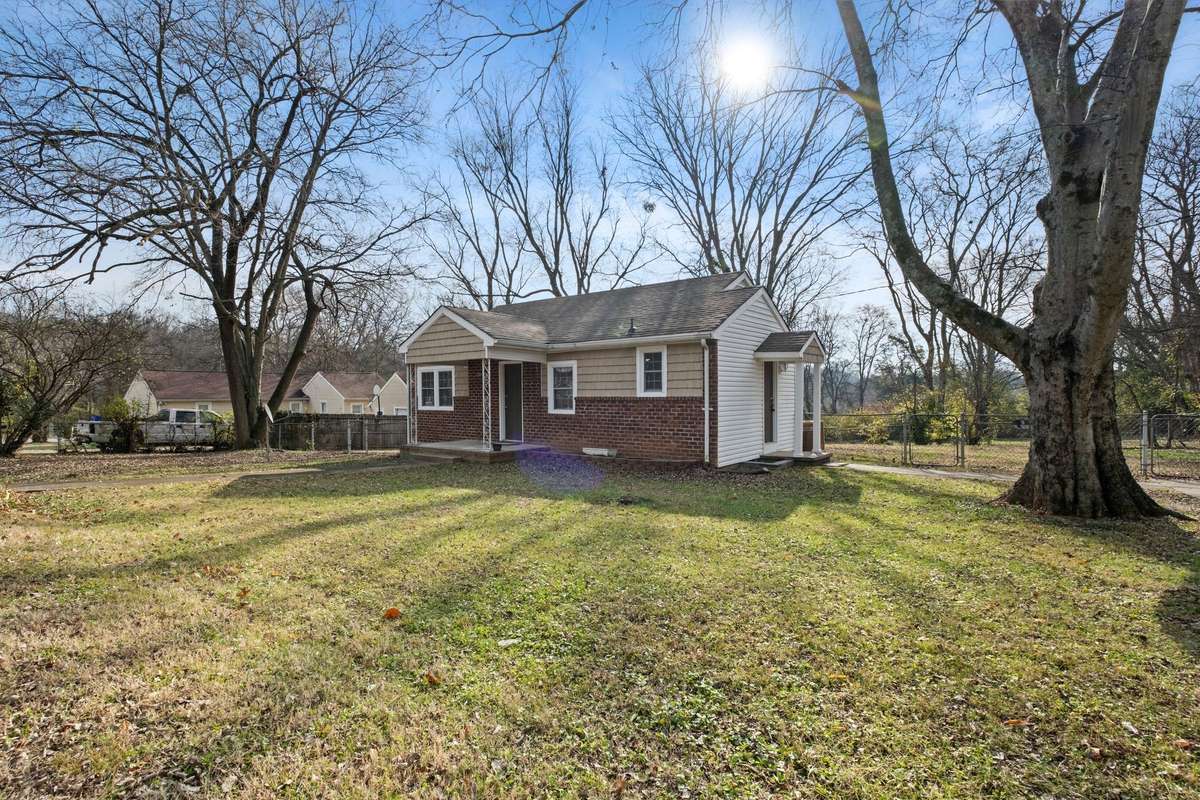 Enjoy the one level living in the cute cottage!   The trees are health and beautiful when green!