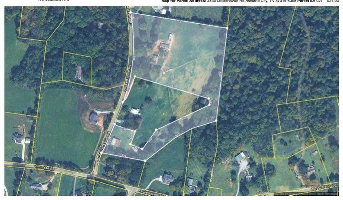 The property boundary is the area shaded in white.