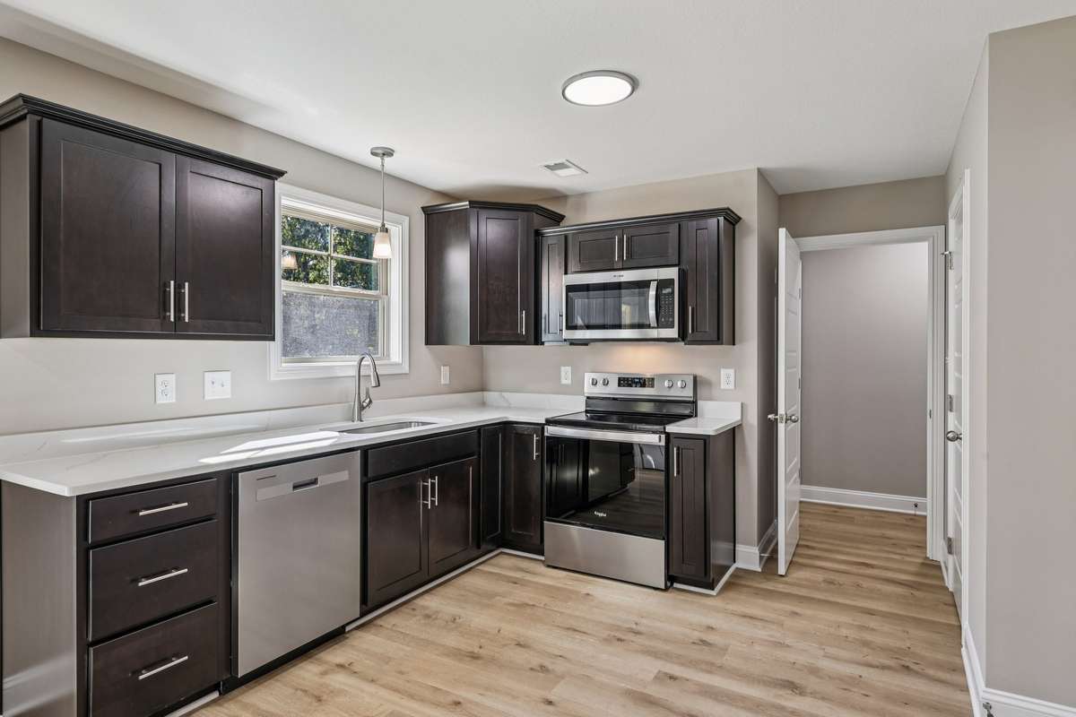 Sample pictures from a previous build showing the Baker Floor Plan. Materials and colors are subject to change without notice.