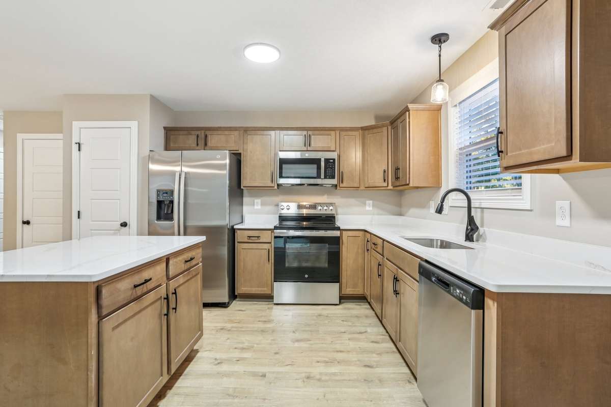 Sample pictures from a previous build showing the Brittany Floor Plan. Materials and colors are subject to change without notice.