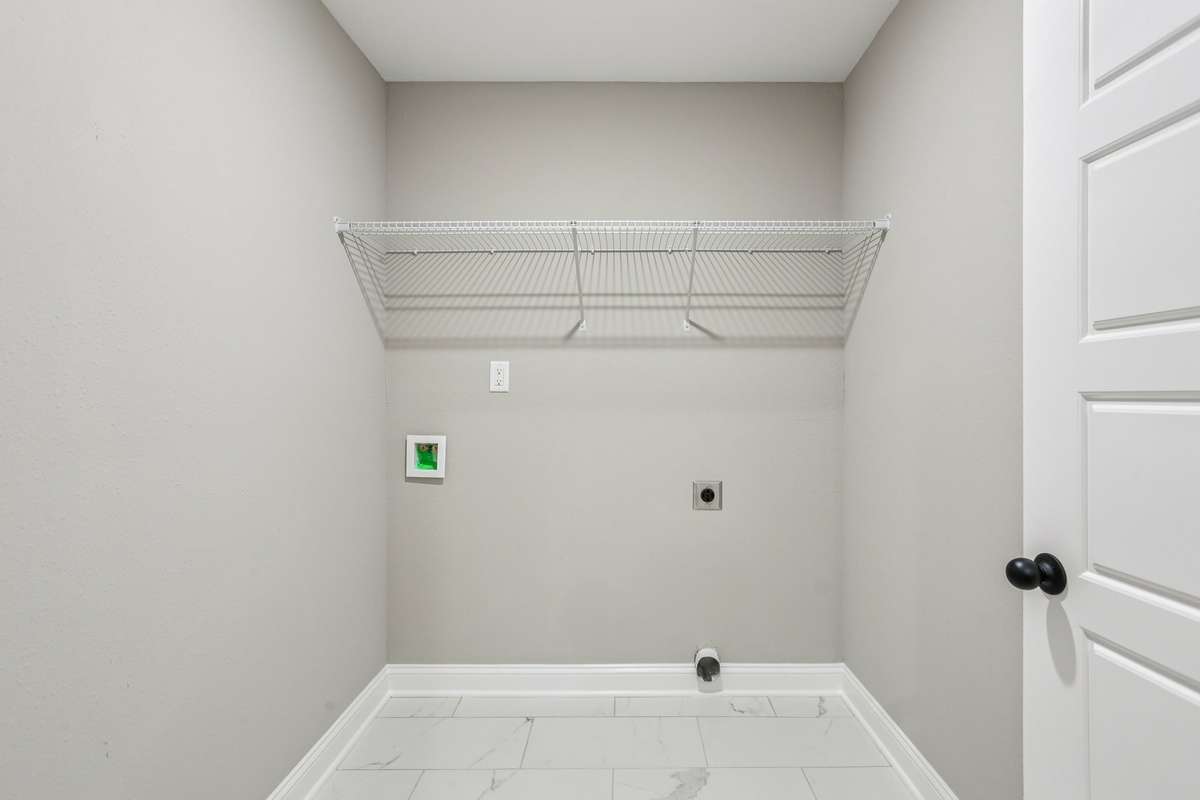 Sample pictures from a previous build showing the Brittany Floor Plan. Materials and colors are subject to change without notice.