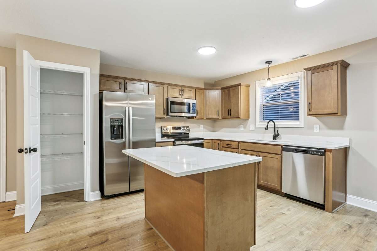 Sample pictures from a previous build showing the Brittany Floor Plan. Materials and colors are subject to change without notice.