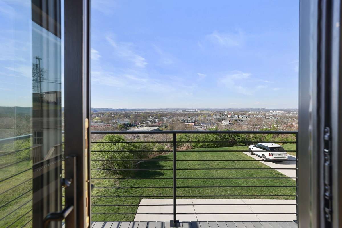 Enjoy a cup of coffee on you primary bedroom balcony