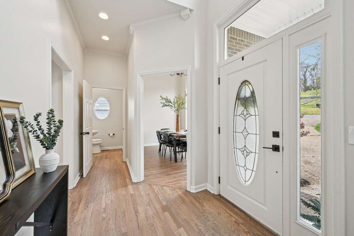 Two story foyer with tons of natural sunlight