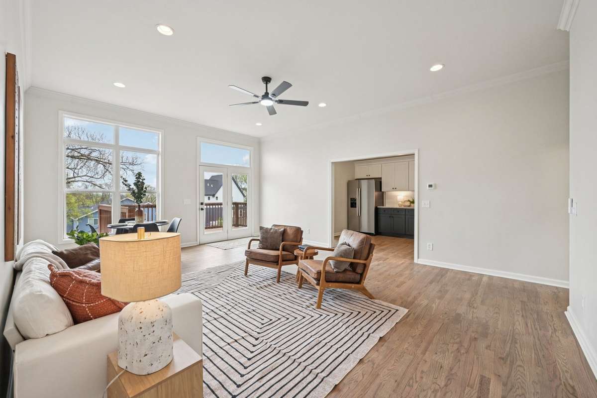 Spacious living room right off kitchen, great for entertaining!