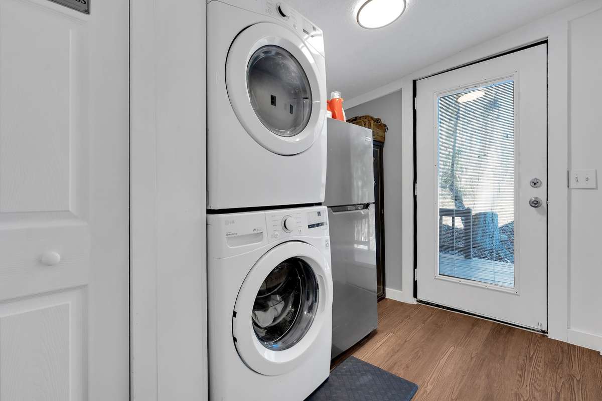 Side entry from driveway with secondary refrigerator.  Washer and dryer will convey.