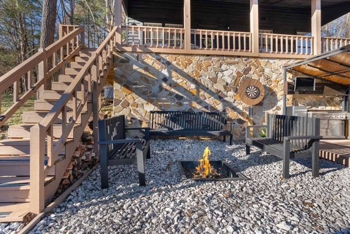 The outdoor area of your dreams!  Firepit, outdoor kitchen and hot tub.
