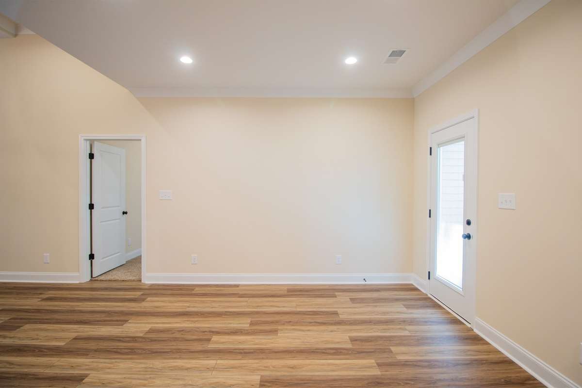 EXAMPLE>>>Spacious Dining Area with Recessed Lighting, Crown Molding and Access to the Back Deck!