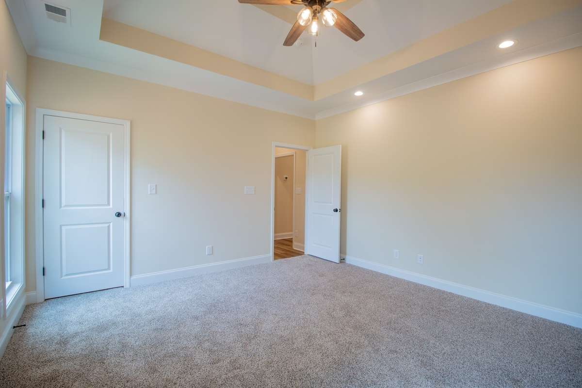 EXAMPLE>>>Another View of the Primary Bedroom and One of the Walk-in Closets!