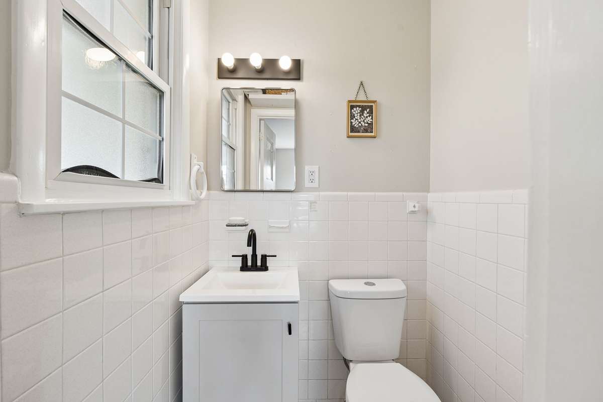 Second half bathroom in the primary bedroom