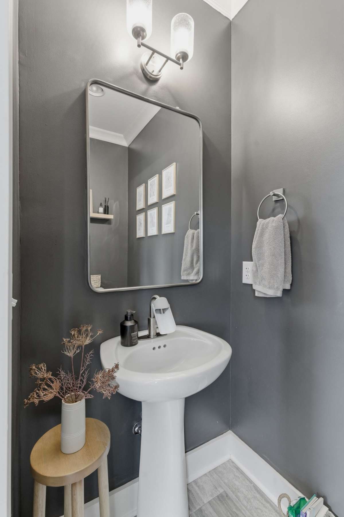 A convenient half bath is tucked off the dining room.