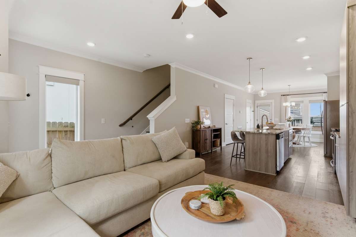 Shining hardwood floors flow throughout the main living areas.
