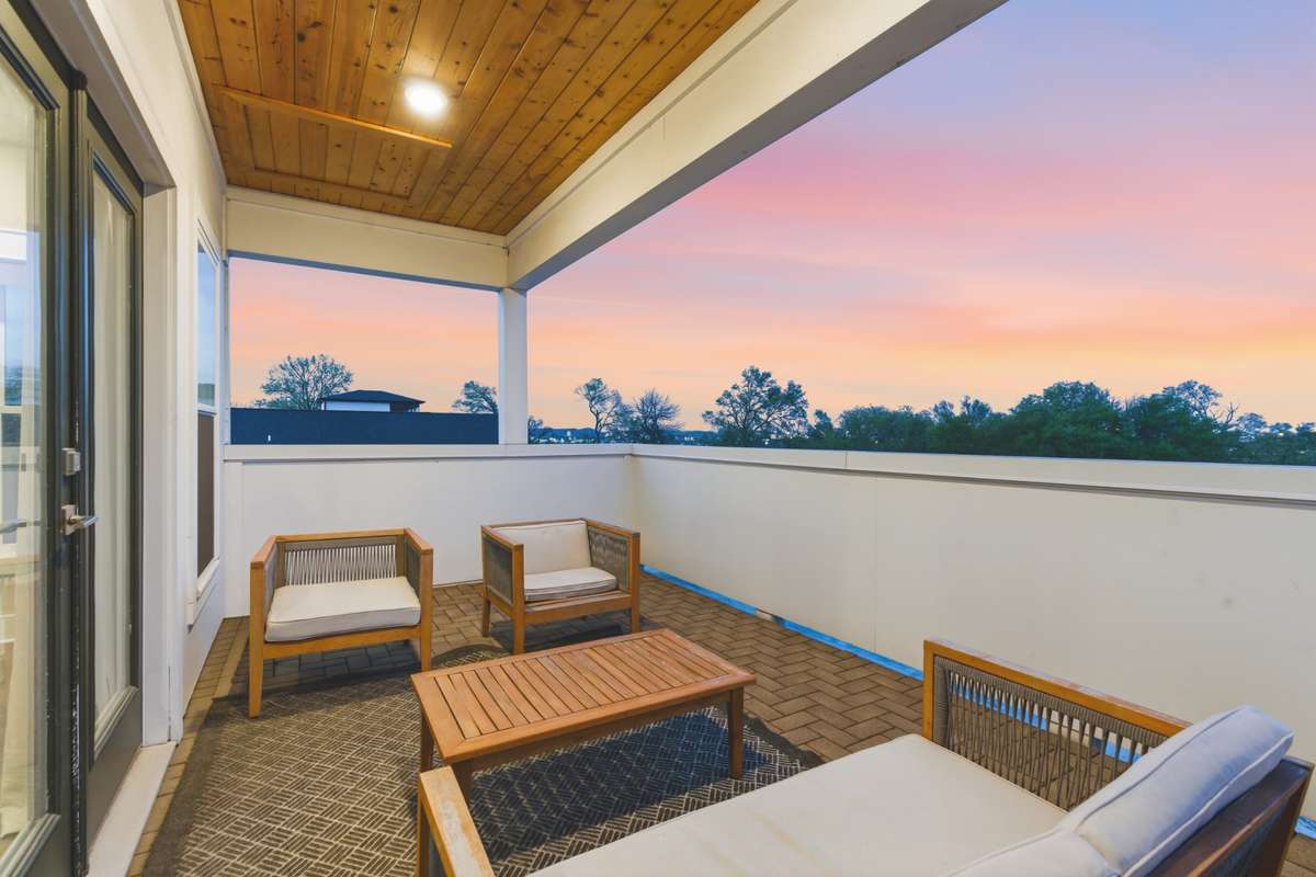 The rooftop deck is one of this home's best features! This is the perfect spot for your early morning coffee or drinks with friends after a busy day.