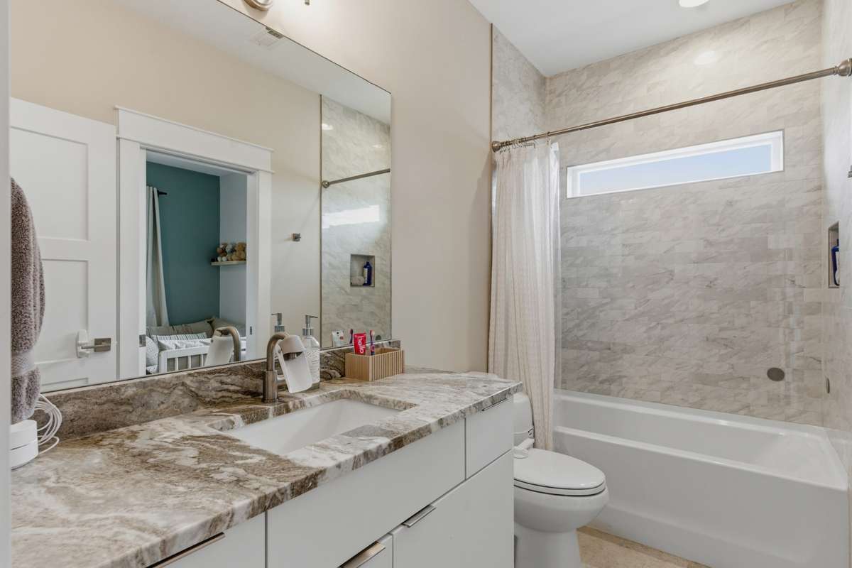 Each bedroom has its own full bath, ensuring space and privacy for everyone!