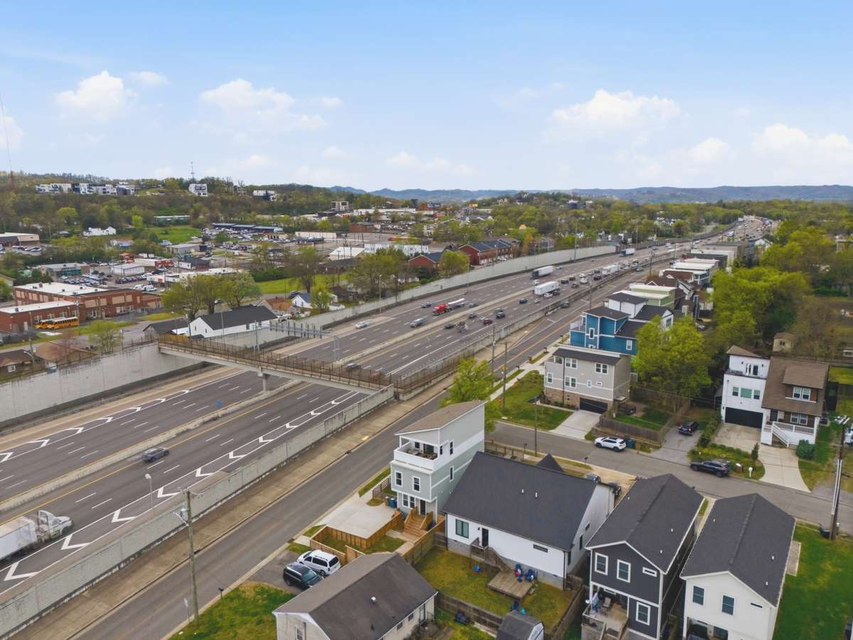 You're also across the street from a pedestrian bridge that lets you easily access the shops, gyms, and restaurants on Charlotte Avenue.