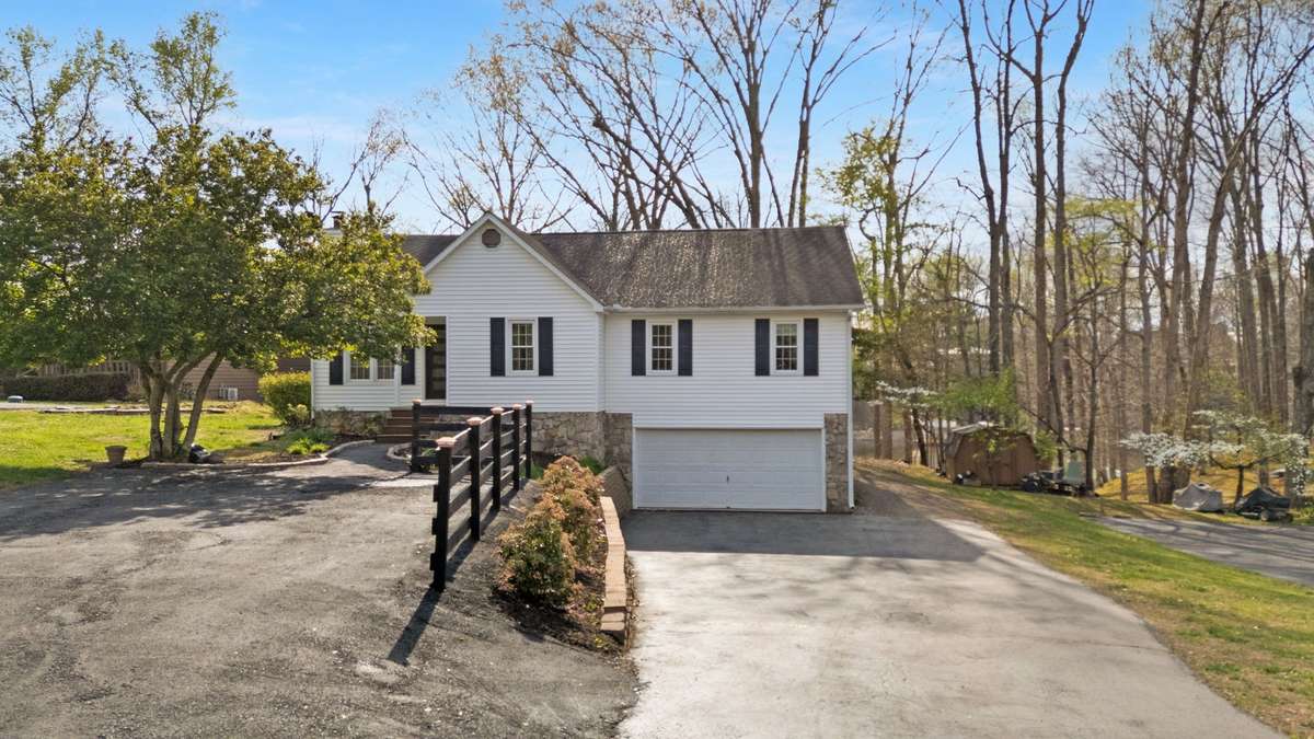 Sellers have added additional paved parking space. 645 Wildwood Trace, Winchester, TN 37398