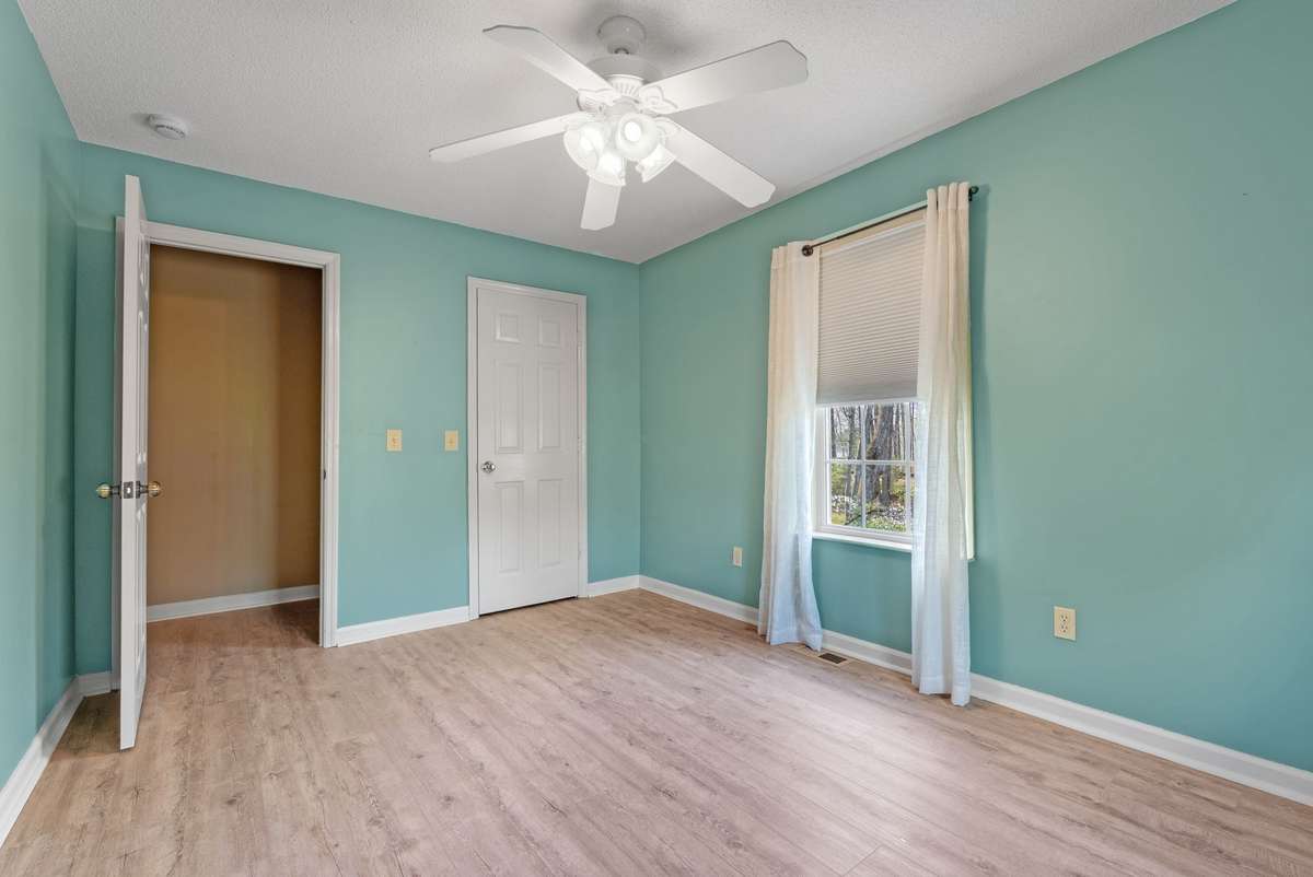Fourth bedroom with large closet, ceiling fan & window! 645 Wildwood Trace, Winchester, TN 37398